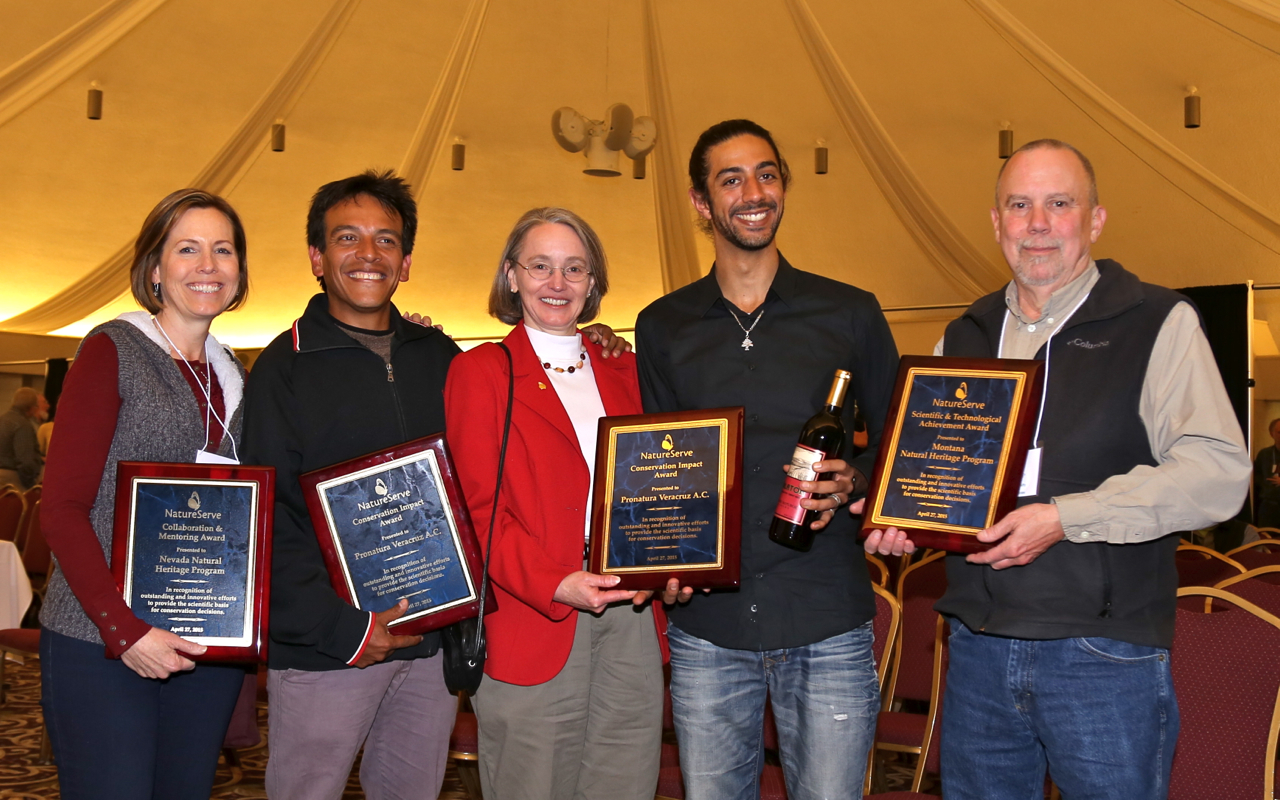 Mary Klein (center) with the winners of this year's Member Awards, from left: Kristin Szabo of the Nevada Natural Heritage Program, Anibal Ramirez and Fadi Farhat of Pronatura Veracruz, and Allan Cox of the Montana Natural Heritage Program.