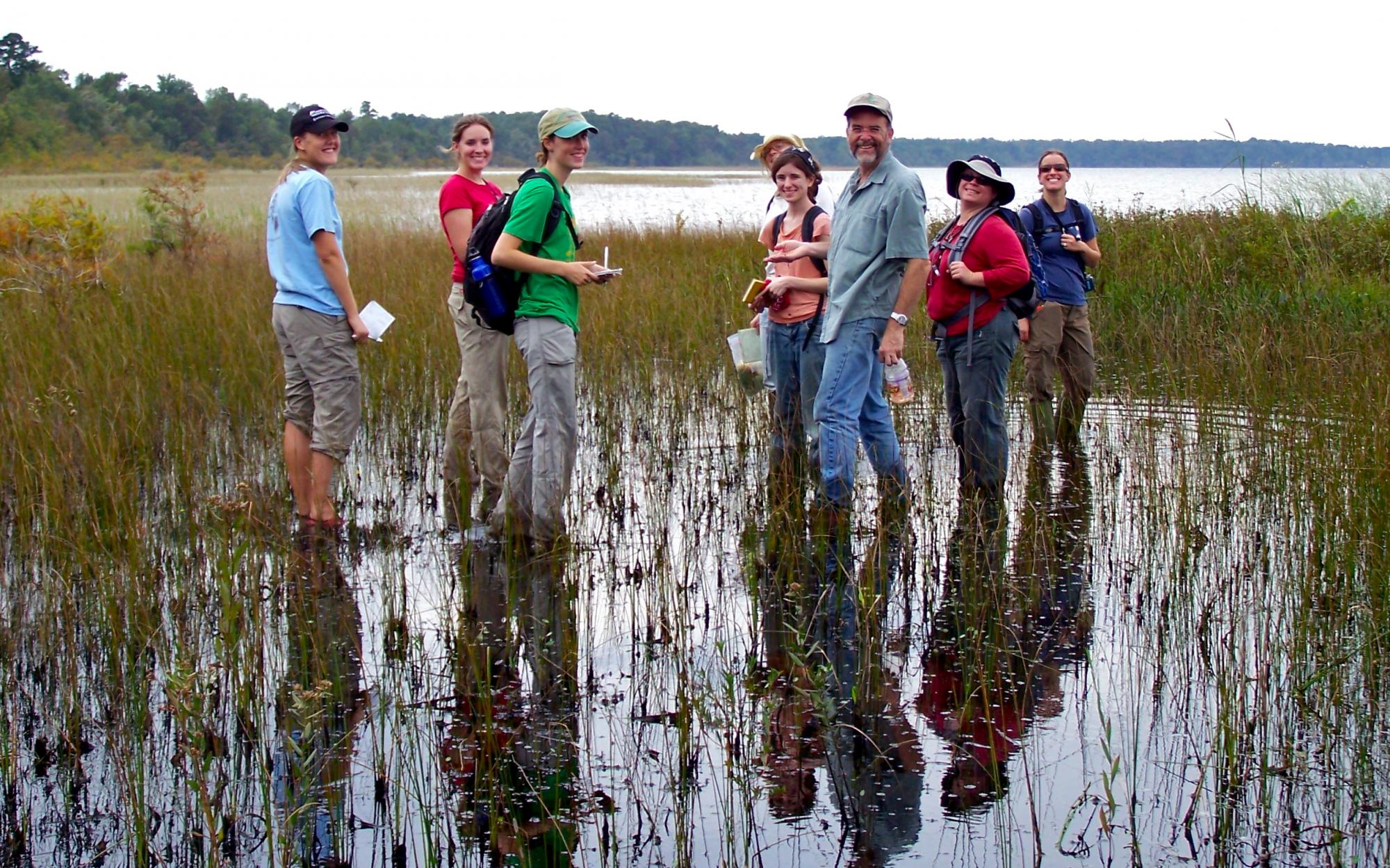Alan Weakley leads graduate students at the University of North Carolina on excursion along the shores of Lake Waccamaw.